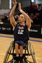 John Gilbert shoots at the under-23 International Wheelchair Basketball Federation championships in Paris.