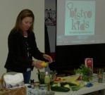In Lafayette County, Kiersten Firquain, a chef with Bistro Kids, presented a demonstration on creative ways to prepare fresh vegetables and incorporate them into school meals. She also taught knife technique at the Farm to Cafeteria workshop attended by area school food service staff.  In 2007, Bistro Kids launched the Farm to School Lunch Program and currently feeds healthy lunches to nearly 1000 students in Kansas City and St. Louis.  