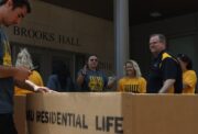 MU Chancellor Alexander N. Cartwright volunteers during move in day at Mizzou. This year, more than 6,700 students are choosing to live in residential halls. 